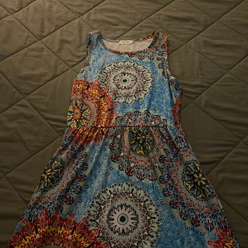 Multi colored women's maxi dress with side pockets.
